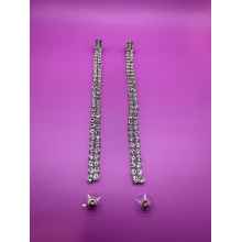 Elegant drop down rhinestone earrings featuring sparkling crystals in a cascading design. Perfect for weddings, parties, and glamorous evenings.