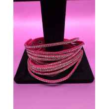 Bold and vibrant fuchsia wrap-around bracelet that adds a pop of color to any outfit. Stylish, versatile, and perfect for casual or formal wear